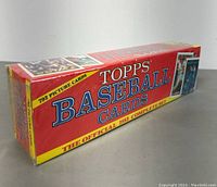 Photo of sealed rectangular box of Topps Baseball Cards 1988 complete set showing branding, card images and card count.