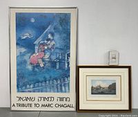 Full view of two framed prints, larger Marc Chagall tribute on left, smaller Lefebvre landscape on right.