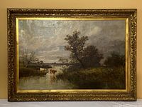 Full view of framed oil painting with pastoral scene and cattle