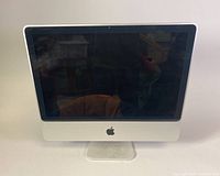 Front view of Apple 21-inch iMac, showing screen, Apple logo, and aluminum stand.