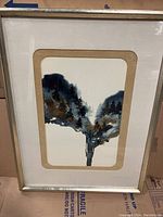 Full view of the framed signed artwork showcasing abstract landscape in dark blue and brown hues.