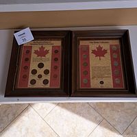Two wooden framed Canadian coin collections placed side by side showing coins and maple leaf designs.