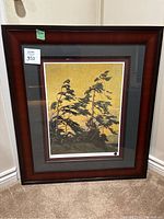 Full view of wooden framed Pine Island Georgian Bay print with dark reddish-brown frame and double mat