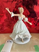 Front view of full figurine on base