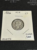 Obverse view of the 1926 US Mercury Dime showing the winged Liberty head, date, and handwritten labels noting year, country, condition VF, silver .900, and denomination 10 cents.