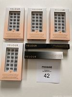 Four boxes of Velour Extension Refill lash clusters (peach and white packaging) and one black box for Lash Bond adhesive plus one black box for Eyelash Tool, all new and unopened.