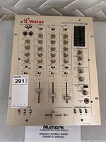 Top view of Vestax PCV-275 DJ mixer showing all controls and input/output jacks with MaxSold sticker.