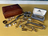 Full lot overview showing all jewelry and wooden box