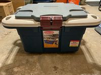 Front view of Rubbermaid Survivor XC cooler showing front label, locking lid, and handles.