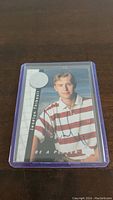Front view of first Jocelyn Thibault signed hockey trading card in protective sleeve