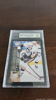 Front side of Sidney Crosby 2009-10 Upper Deck rookie card in PSA graded slab showing grade 9 Mint.