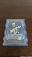View of Victor Soderstrom autographed hockey card with him in Arizona Coyotes uniform, card enclosed in plastic protective sleeve.