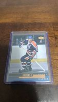 Front of Wayne Gretzky 1989 Upper Deck Edmonton Oilers hockey card in protective sleeve.