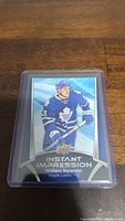 Front of the William Nylander hockey card showing player image and Instant Impression branding.