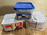 Photo showing three boxes and container of screws and nails