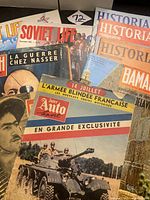 Photo of the collection showing several magazines including Soviet Life, Historia, Bamahane, and Inter Auto Sport, arranged for viewing.
