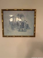 Full frontal view of the framed giraffe print showing the artwork and bamboo style frame