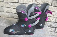 Side view of Dolomite 363 ski boots showing black body with pink and grey buckles, branding visible.