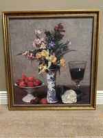 Front view of Henri Fantin-Latour print in gold frame showing floral still life with strawberries, wine glass, and cherries