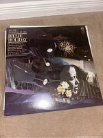 Billie Holiday album cover 'All or Nothing at All' featuring Billie Holiday's portrait and album details.