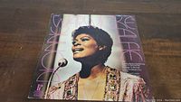 Front cover of Dionne Warwick 'Alfie' vinyl album with color photo and title text