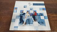 Front cover of the vinyl record album Measure for Measure by Icehouse showing band members in a modern grid design