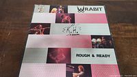 Front cover of Wrabit Rough & Ready vinyl LP showing the band name, album title, and band member photos.