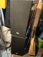 Two stacked black Kenwood KS-3000 speakers with fabric covers and logo badges.