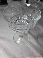 Close-up of Chantelle D'Arques Durand sherbert glass showing wide bowl with geometric cut pattern and faceted stem.