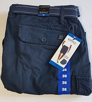 Folded navy blue Buffalo David Bitton size 36 cargo shorts with belt and tag visible