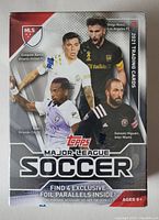 Front view of the Topps 2021 Major League Soccer blaster box featuring soccer players and branding.