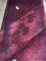 Full view of rug showing overall color and repeating motif