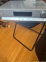 Front view of the Panasonic DVD home theater sound system showing model and control panel with disc changer