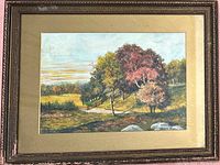 Full view of the framed watercolor landscape painting showing trees, a path, and a fence under glass.