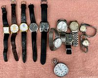 Top-down photo showing all 10 wristwatches and 1 pocket watch arranged on a pink fabric background.