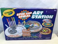Closed box of Crayola Spin and Spiral Art Station showing product image, branding, and features.