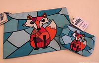 Photo showing the Decoludik pouch and change purse with fox design and visible tags indicating new condition.