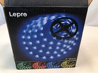 Box front showing Lepre brand LED strip lights with colorful lighting display and mention of 2 x 24.6 ft length.