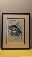 Framed art print depicting Indigenous style illustration titled 'Motherhood' by Cecil Youngfox.