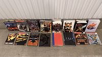 Full overview photo of the gaming books and magazines laid out in a row showing various titles and colorful covers.