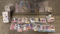 Full spread of all One Piece trading cards in lot with box included