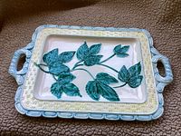 Top view of the rectangular ceramic tray showing basket weave border and ivy leaf design