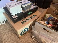 Overview of CDs magazines stacked on PD-M40 atop TX-900 box