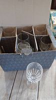 Box containing six clear Lenox stemware wine glasses with individual cardboard compartments for protection.
