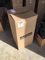 Paccar Genuine Parts branded cardboard box containing the air filter, showing size and condition of the packaging.