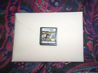 Front side of the Lego Lord of the Rings Nintendo DS game cartridge showing label with game art and Nintendo DS logo.