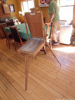 Folding Mabef wooden easel with the lid open showing inside storage tray and three legs extended with wooden and metal construction.