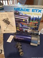 Meade ETX Spotting Scope with original box and instruction manual, assembled and laid out on table