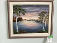 Framed Avalon Hicks wall painting showing lake and trees at sunset or sunrise.