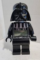 Front view of the Darth Vader LEGO minifigure digital clock showing the digital display.